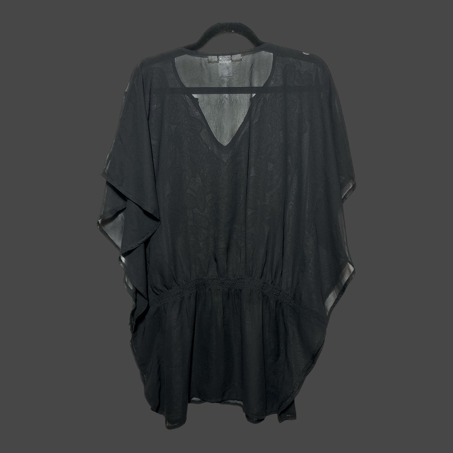 But I Wish It Was Black sheer black tunic with a V-neck, flutter sleeves, and a gathered elastic waist on a hanger.