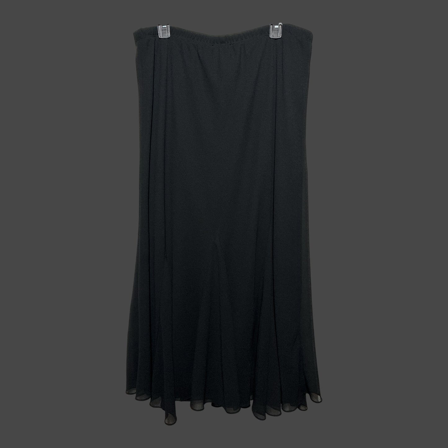 But I Wish It Was Black flowing black chiffon midi skirt with an elastic waistband and a graceful flared silhouette.