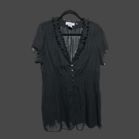 But I Wish It Was Black sheer black chiffon blouse with ruffle V-neck, button-down front, and smocked waist.